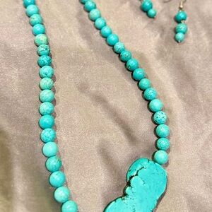 Blue and Silver Necklace with Polished Beads and Irregular Pendant